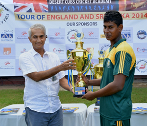 Under-15 runners-up St. Anne’s Colleg receiving the trophy from Chief Guest Sidath Wettimuny