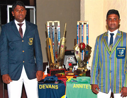 Maliyadeva College and St. Anne's College skippers pose together with the trophies which are on offer for the Battle of the Rocks